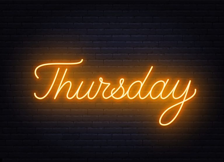 Thursday neon sign on brick wall background.